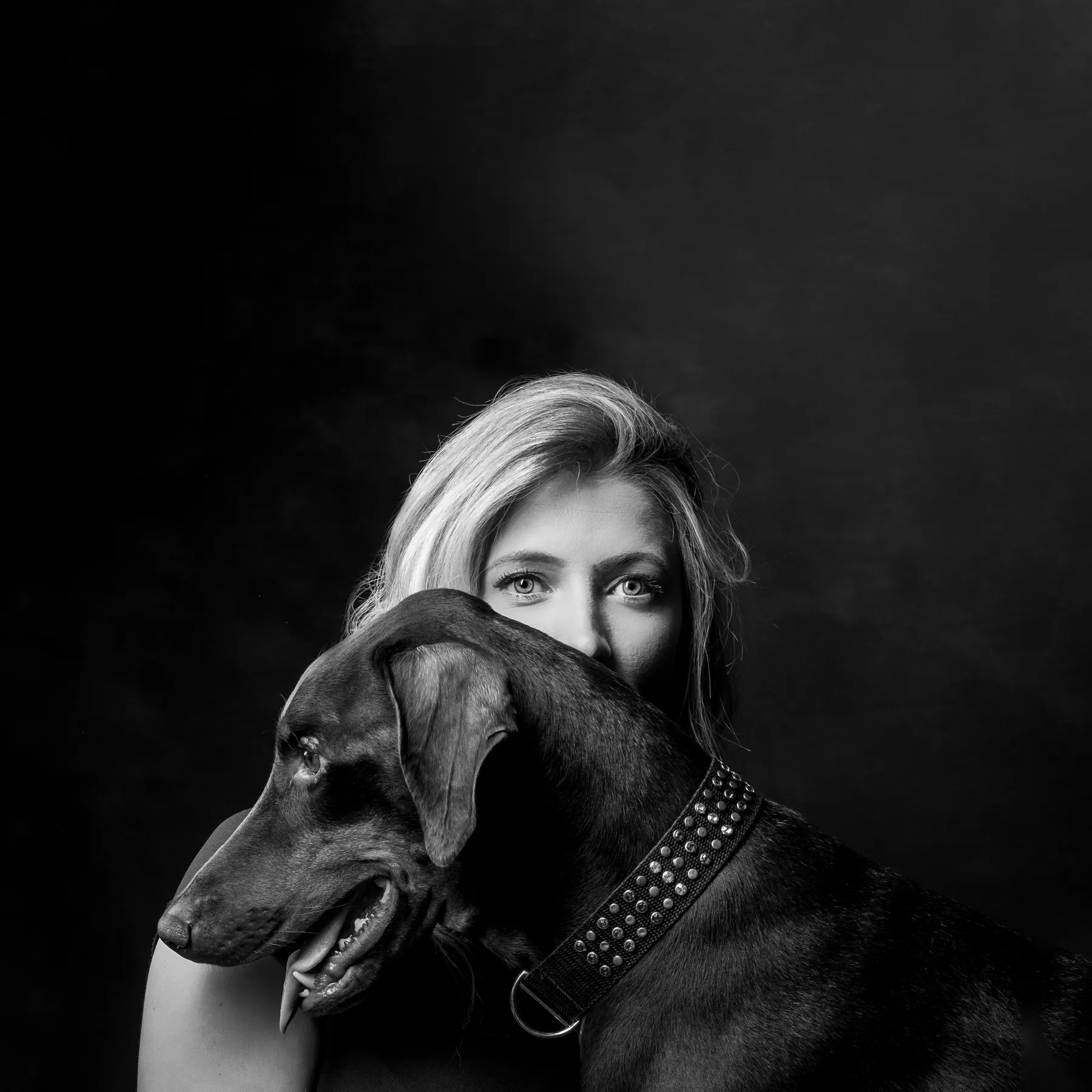 Woman with dog at photoshoot at Richard Hill studio.