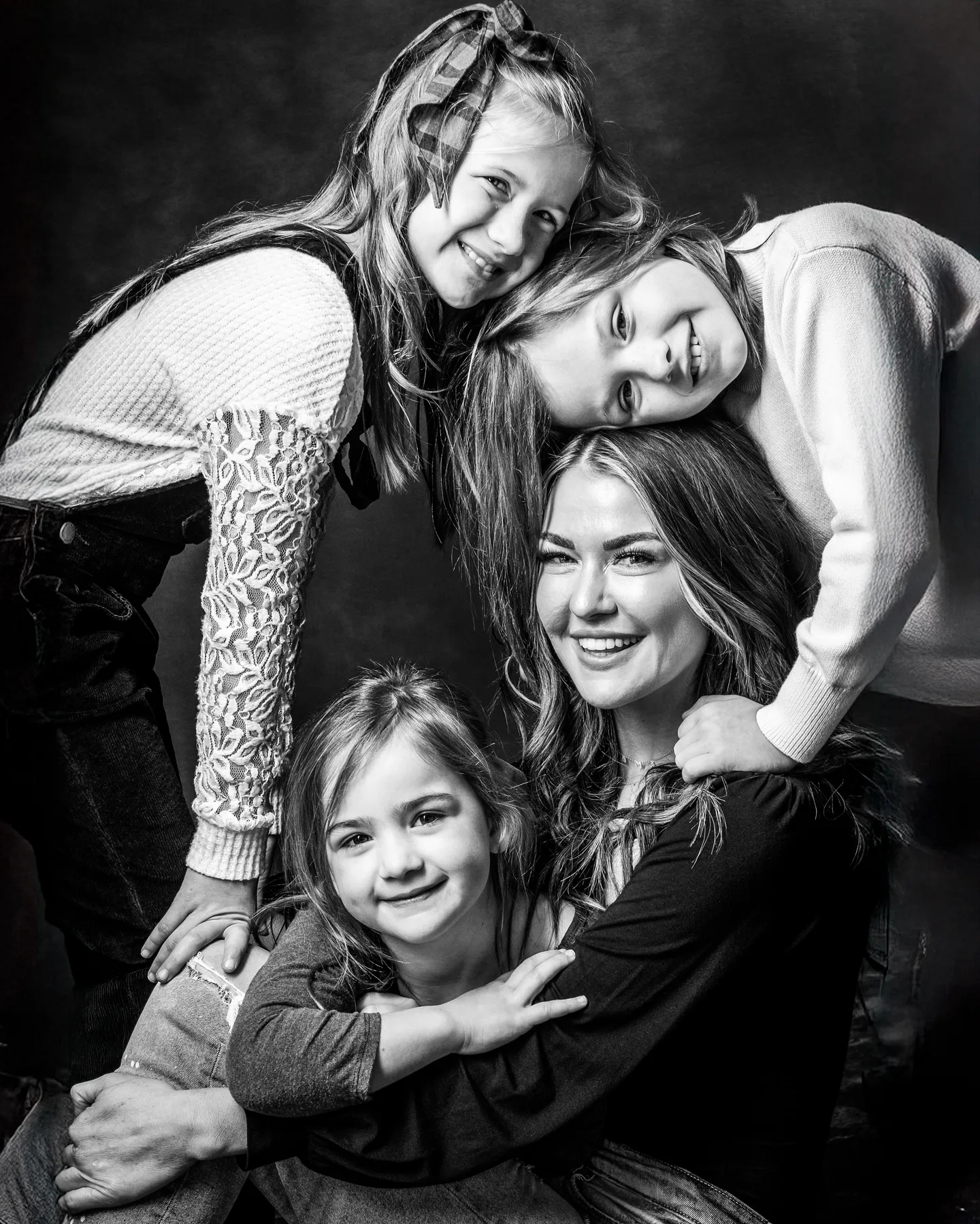 Mother and family at a family portrait session at richard hill studio in texas