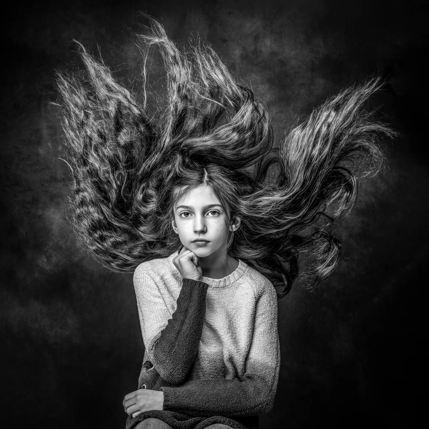 Young girl wearing casual clothes for her portrait session at Richard Hill Studio, Dallas. 