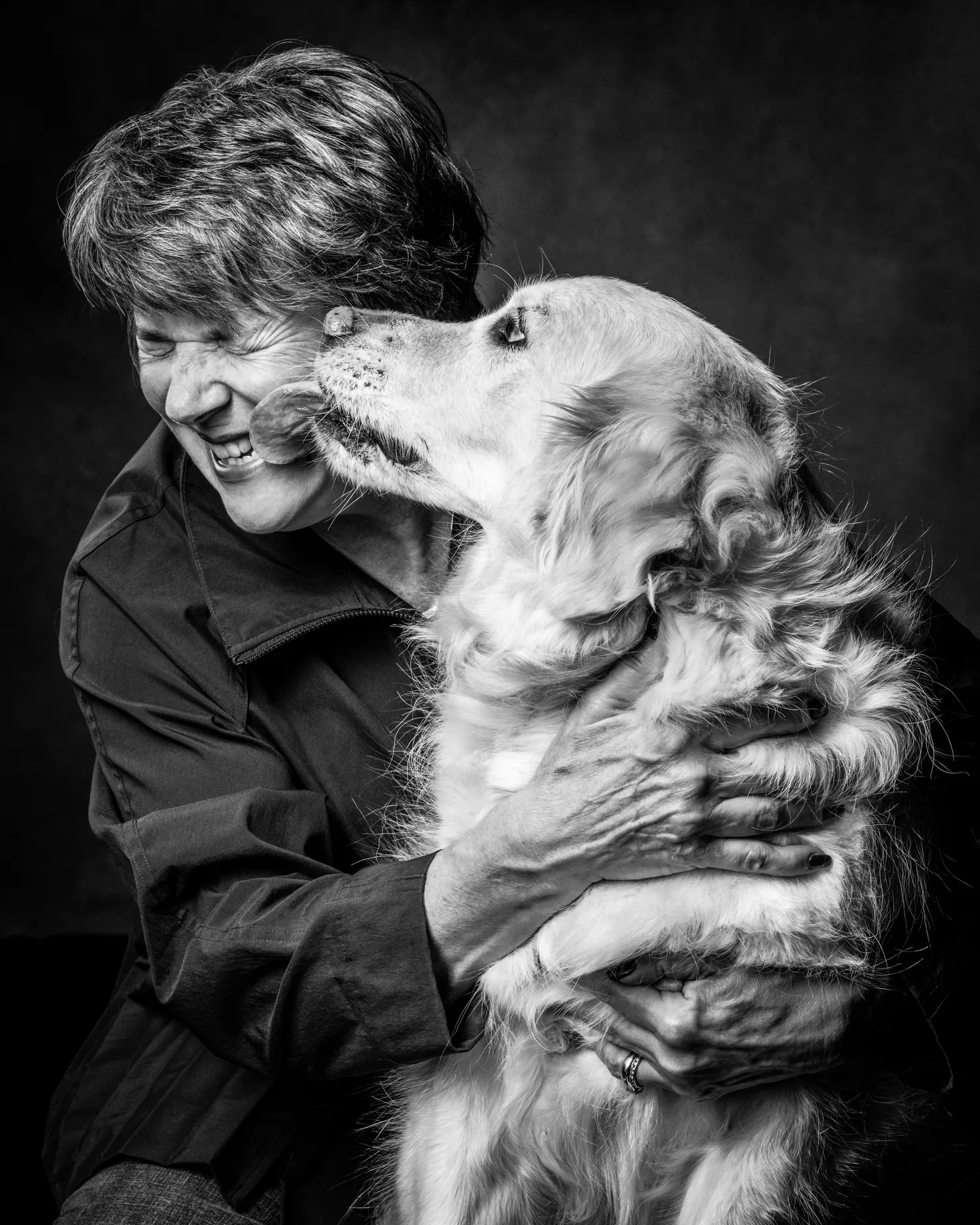 Dog licking owners face. Pet Photographer Dallas Texas